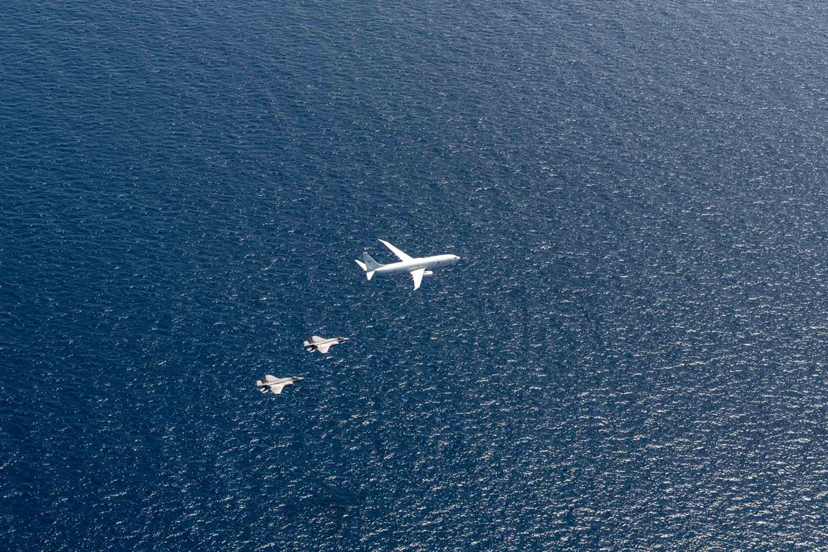 A flypast by an RAAF P-8A Poseidon and two F-35A Lightning II aircraft (Clarice Dupont/Defence Department)